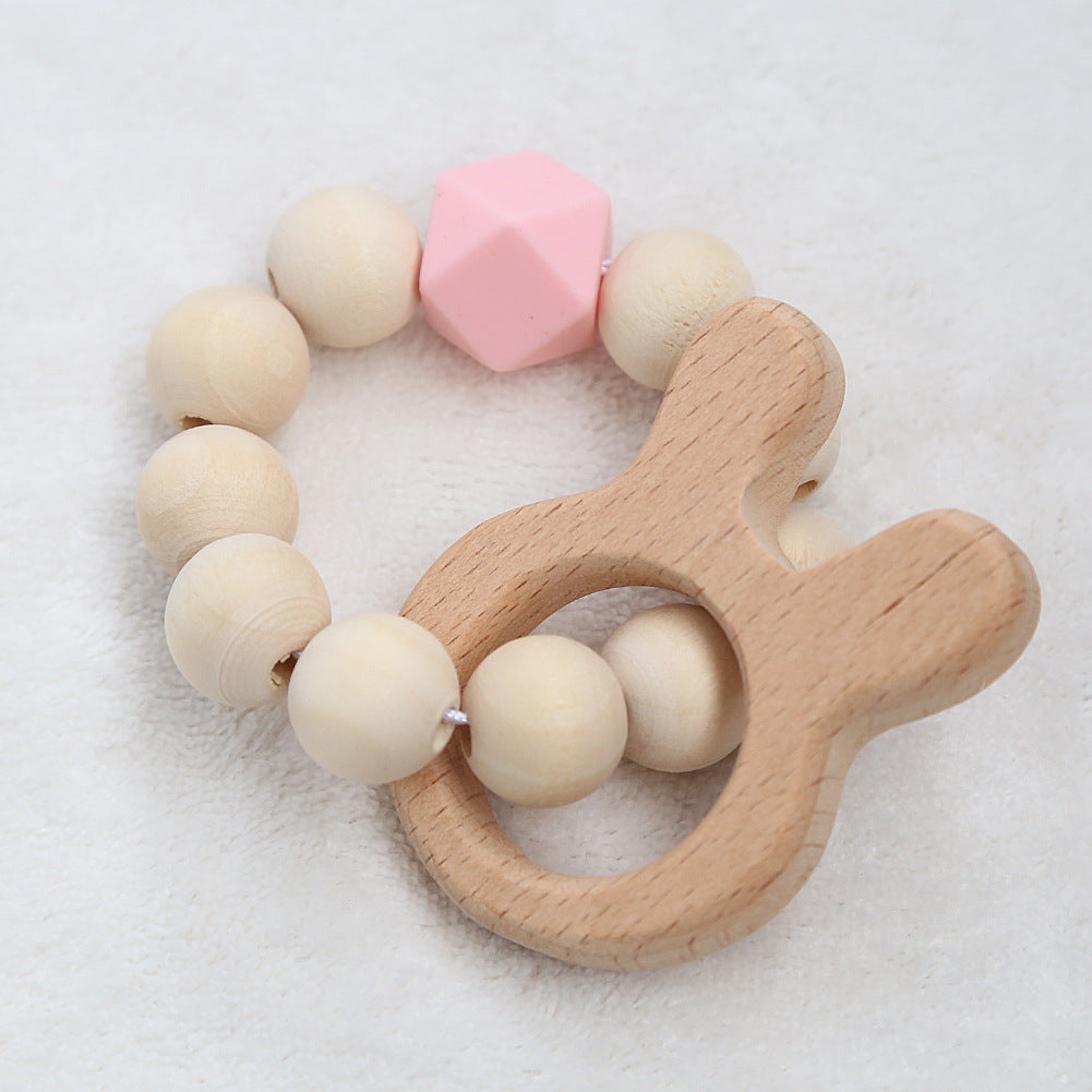 Perles en bois pour bébé