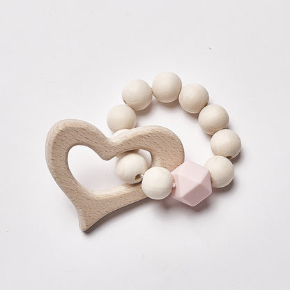 Perles en bois pour bébé